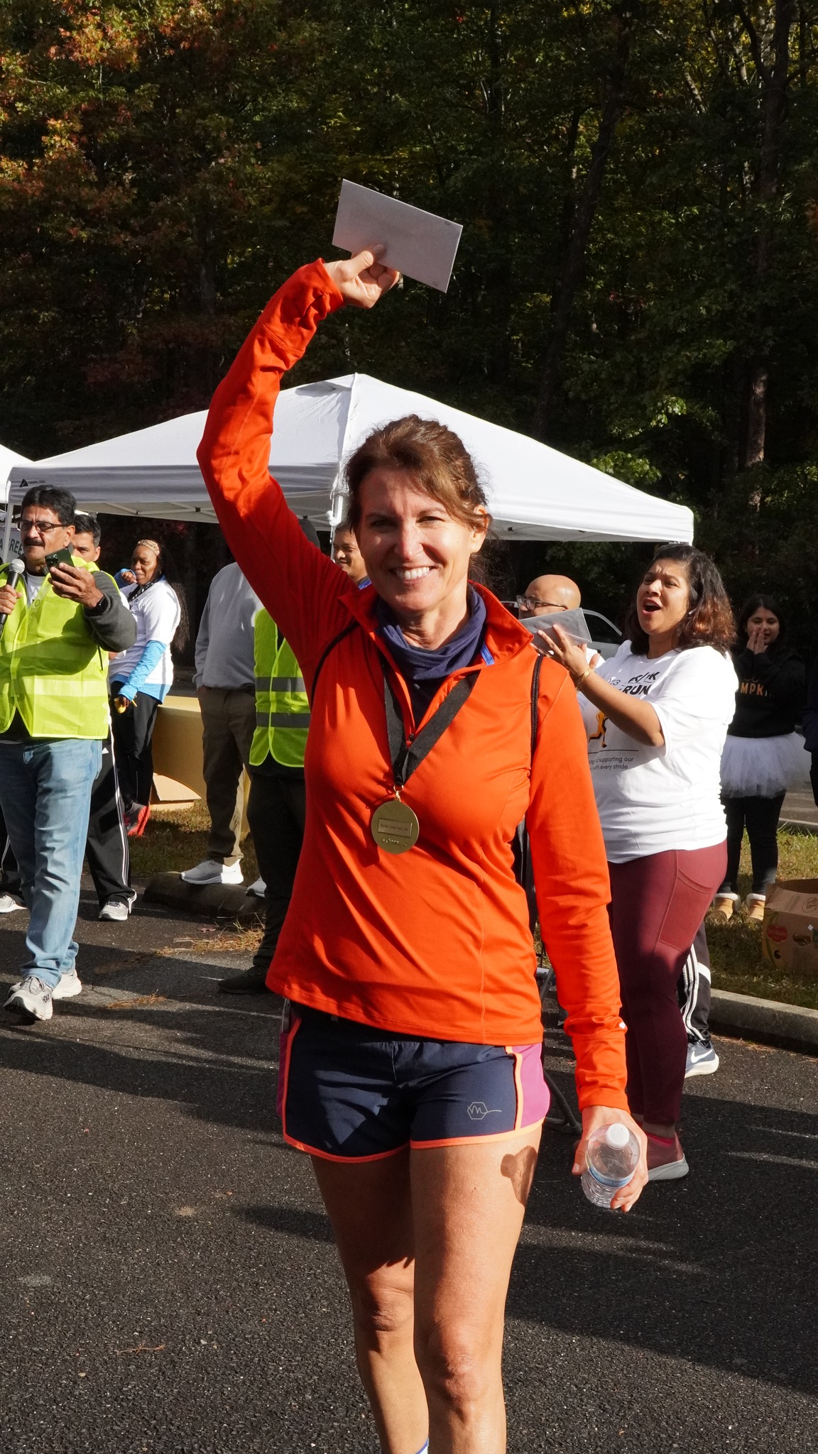 Royals Run medal finisher waving at the camera
