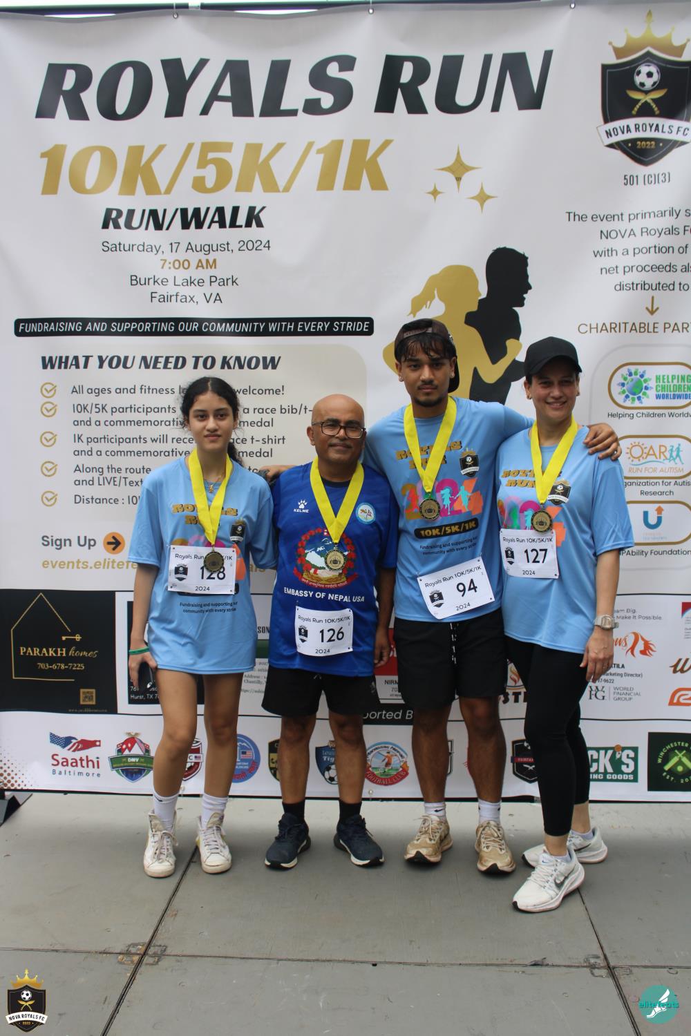 Royals Run finishers posing with their medals